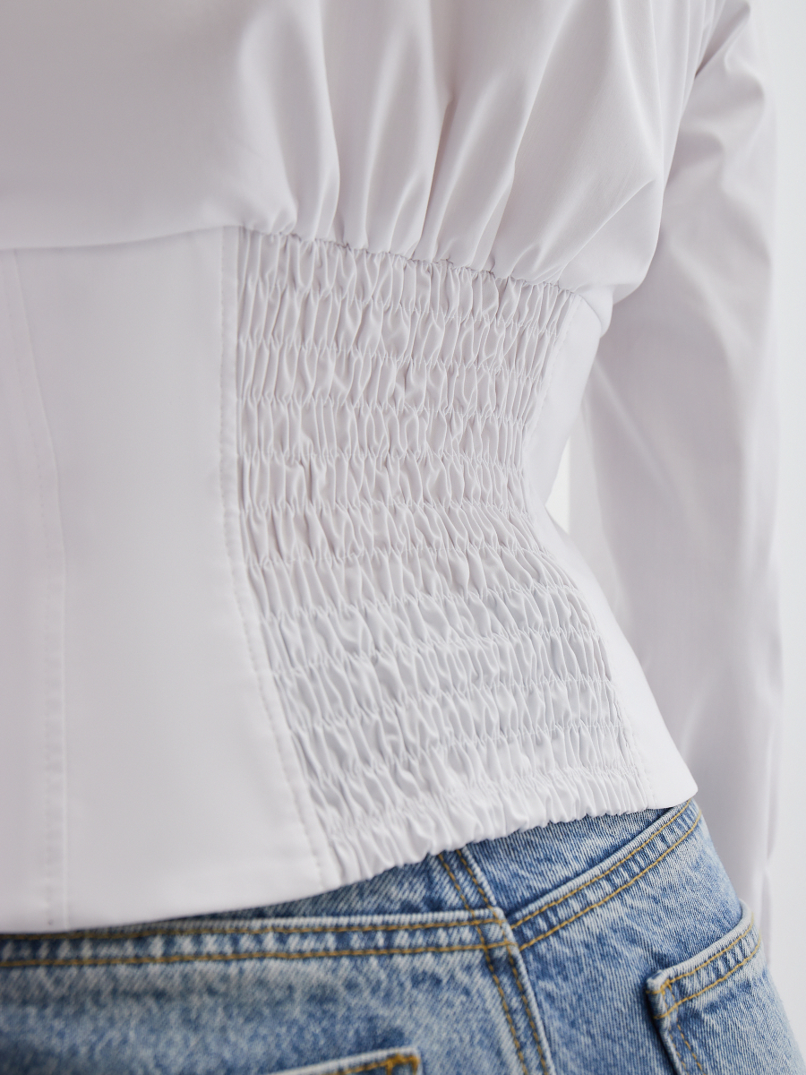 Блузка с имитацией корсета и удлиненными манжетами 